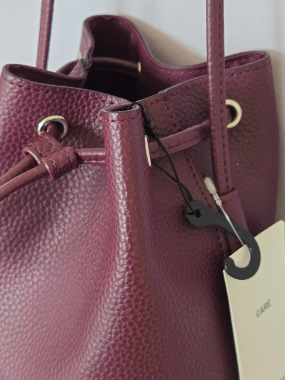 UNIQLO Faux Leather Drawstring Mini Shoulder Bag - Picture 8 of 14